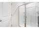 Bathroom with glass shower doors and neutral tile at 5512 Henley Ridge Dr # 191, Graham, NC 27253