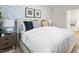 Main bedroom with floral wallpaper, and window with blinds at 5512 Henley Ridge Dr # 191, Graham, NC 27253