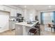 Modern kitchen features granite countertops, stainless steel appliances, and an island with seating at 5512 Henley Ridge Dr # 191, Graham, NC 27253