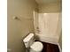 Full bathroom with shower/tub combo, toilet, and hardwood floors at 7041 Spanglers Spring Way, Raleigh, NC 27610