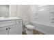 Bathroom with white vanity, toilet and bathtub at 1129 Capulet Dr, Burlington, NC 27215