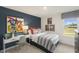 Spacious bedroom with a desk and plenty of natural light at 113 Reagan Crest Dr, Clayton, NC 27520
