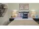 Cozy bedroom featuring stylish decor and ample lighting at 113 Reagan Crest Dr, Clayton, NC 27520