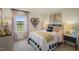 Charming bedroom with a unique wall decor and comfortable bed at 113 Reagan Crest Dr, Clayton, NC 27520