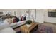 Living room with a beige sofa and a wooden coffee table at 113 Reagan Crest Dr, Clayton, NC 27520
