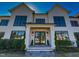 Stunning two-story home with a white brick facade and large windows at 1425 Sky Vista Way, Raleigh, NC 27613