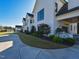 White modern home with landscaped grounds and driveway at 1425 Sky Vista Way, Raleigh, NC 27613