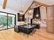 Open kitchen with breakfast bar, high-end appliances, and access to backyard at 1425 Sky Vista Way, Raleigh, NC 27613