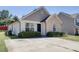 House exterior with a gray and beige color scheme at 1732 Great Bend Dr, Durham, NC 27704