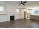 Spacious living room with fireplace, built-in shelving, and hardwood floors at 1809 Bright Lantern Way, Wendell, NC 27591