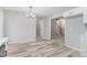 Light-filled dining area adjacent to kitchen with access to other rooms at 2217 Maybrook Dr, Raleigh, NC 27610