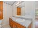 Double vanity bathroom with a large mirror and a spacious layout at 307 Country Club Dr, Durham, NC 27712