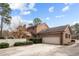 Brick house with attached garage and a white fence at 3904 Hawthorne Rd, Rocky Mount, NC 27804