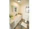 Clean bathroom with a new vanity, tile floor, and updated fixtures at 421 S Morgan St, Roxboro, NC 27573