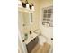 Clean bathroom with modern vanity and fixtures at 421 S Morgan St, Roxboro, NC 27573