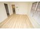 Bedroom with hardwood floors and access to bathroom at 421 S Morgan St, Roxboro, NC 27573