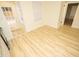 Spacious dining area with wood-look flooring and access to the backyard at 421 S Morgan St, Roxboro, NC 27573