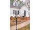 House exterior with a walkway and lamp post at 421 S Morgan St, Roxboro, NC 27573
