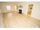 Bright living room with hardwood floors and fireplace at 421 S Morgan St, Roxboro, NC 27573