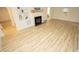 Living room featuring hardwood floors and fireplace at 421 S Morgan St, Roxboro, NC 27573