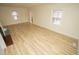 Spacious living room with hardwood floors and fireplace at 421 S Morgan St, Roxboro, NC 27573