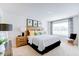 Spacious bedroom with a king-size bed and stylish decor at 507 Fife Ct, Gibsonville, NC 27249