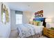 Spacious bedroom with a king-size bed and stylish decor at 507 Fife Ct, Gibsonville, NC 27249