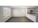 Spacious dining area with large window and kitchen view at 508 Fife Ct, Gibsonville, NC 27249