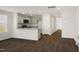 Open kitchen with island and stainless steel appliances at 508 Fife Ct, Gibsonville, NC 27249