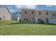 Townhouse exterior showcasing a private backyard at 508 Fife Ct, Gibsonville, NC 27249