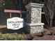 Stone and metal community entrance sign for Holleman Hills South at 5168 Church Rd # 22, New Hill, NC 27562