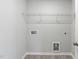 Laundry room with shelving and hookups at 532 Hanover Shore Ln # 714 Oakley, Raleigh, NC 27610