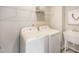 Convenient laundry room with washer, dryer, and utility sink at 536 Hanover Shore Ln # 713 Chadwick, Raleigh, NC 27610