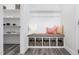 Built-in bench with storage in an entryway at 601 Emerald Bay Cir, Raleigh, NC 27610
