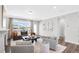 Spacious living room with hardwood floors and fireplace at 601 Emerald Bay Cir, Raleigh, NC 27610
