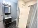 Updated bathroom with a large shower and modern vanity at 603 Forest Dr, Garner, NC 27529