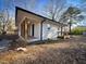 Side view of the house showcasing a deck and landscaping at 603 Forest Dr, Garner, NC 27529