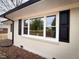 Exterior view showcasing a window with shutters at 603 Forest Dr, Garner, NC 27529