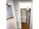 Hall closet with water heater and shelving at 603 Forest Dr, Garner, NC 27529