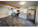 Modern kitchen with stainless steel appliances and granite countertops at 603 Forest Dr, Garner, NC 27529