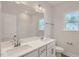 Bathroom boasts double vanity, large mirror, and updated fixtures at 604 Emerald Bay Cir, Raleigh, NC 27610