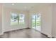 Breakfast nook with hardwood floors and sliding glass door to patio at 604 Emerald Bay Cir, Raleigh, NC 27610