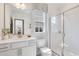 Clean bathroom with walk-in shower and white vanity at 609 Emerald Bay Cir, Raleigh, NC 27610