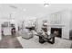 Open concept living room with kitchen and fireplace views at 609 Emerald Bay Cir, Raleigh, NC 27610