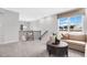 Upstairs loft area features a sitting area and large window at 609 Emerald Bay Cir, Raleigh, NC 27610