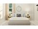 Relaxing bedroom featuring a comfortable bed and a large mirror at 612 Emerald Bay Cir, Raleigh, NC 27610