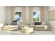 Living room with sectional sofa and round coffee table at 612 Emerald Bay Cir, Raleigh, NC 27610