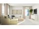 Living room with sectional sofa and a media console at 612 Emerald Bay Cir, Raleigh, NC 27610