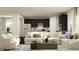 Spacious living room featuring a sectional sofa and dark brown cabinets at 612 Emerald Bay Cir, Raleigh, NC 27610