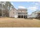 Back of house showing two-story home with deck at 65 Sundew Ct, Clayton, NC 27527